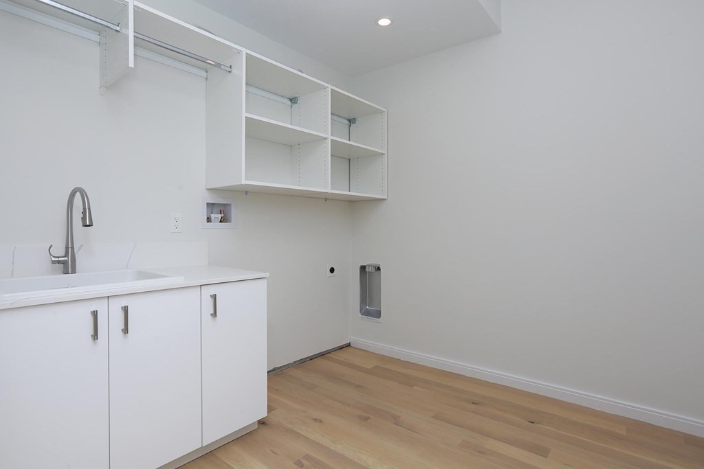 41 Summit Avenue, Unit 41 Brookline, MA 02446 - Photo 18 of 20 a view of small space with racks on the wall