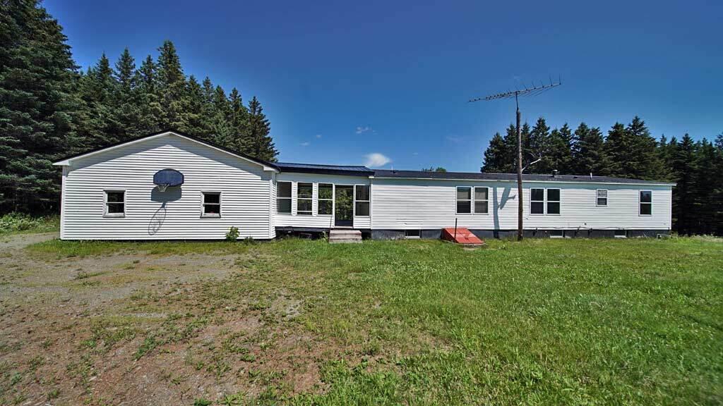 60 Smyrna Center Road Smyrna, ME 04780 - Photo 47 of 52 60-smyrna-center-rd-back-ya