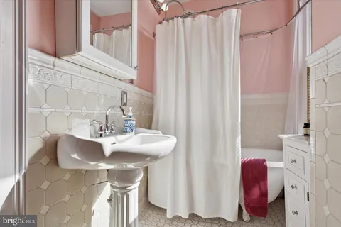 a bed room with a bed and a window