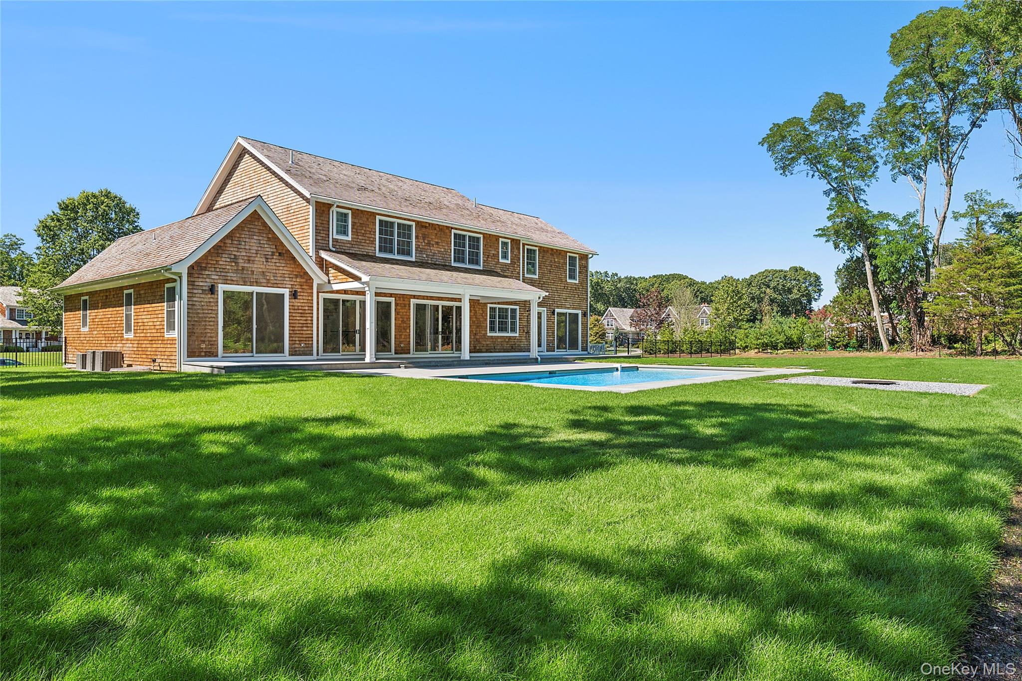 80 Deer Run Southold, NY 11971 - Photo 4 of 29 a front view of house with yard and green space