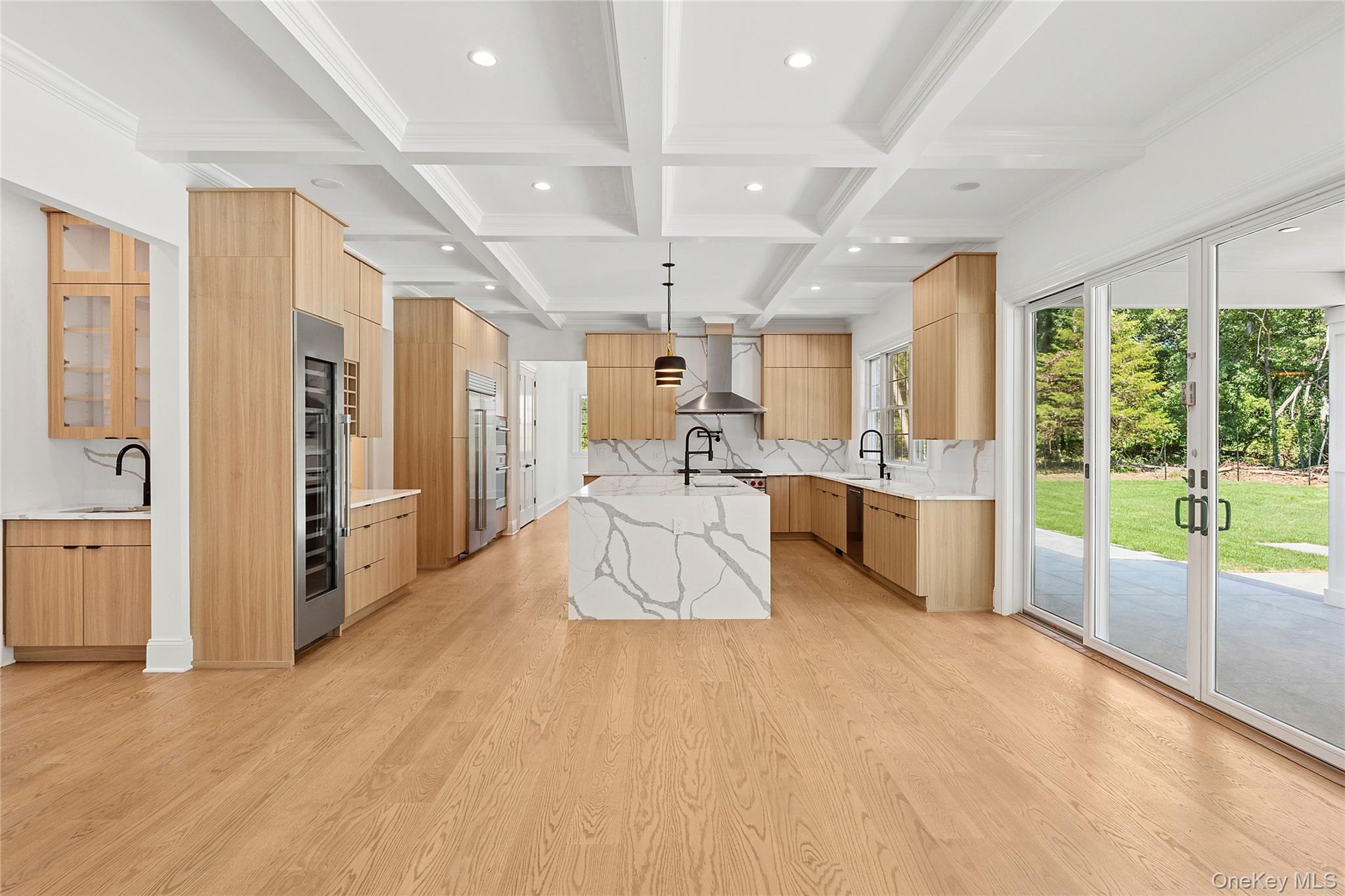 80 Deer Run Southold, NY 11971 - Photo 10 of 29 a large white kitchen with a large window