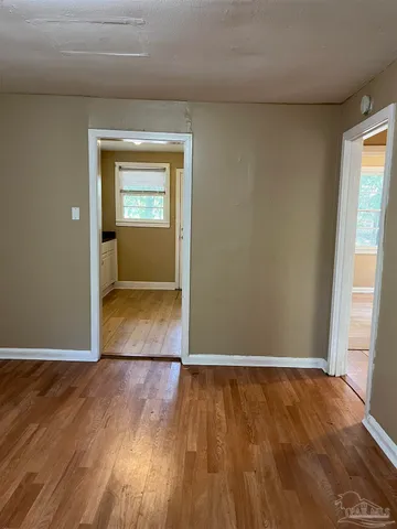 a view of an empty room and window