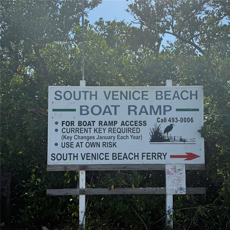 Southland Road Venice, FL 34293 - Photo 4 of 12 a sign on the side of a building