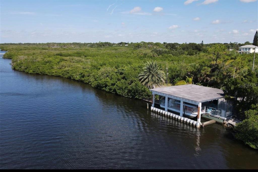 Southland Road Venice, FL 34293 - Photo 6 of 12 a view of a house with pool and lake view