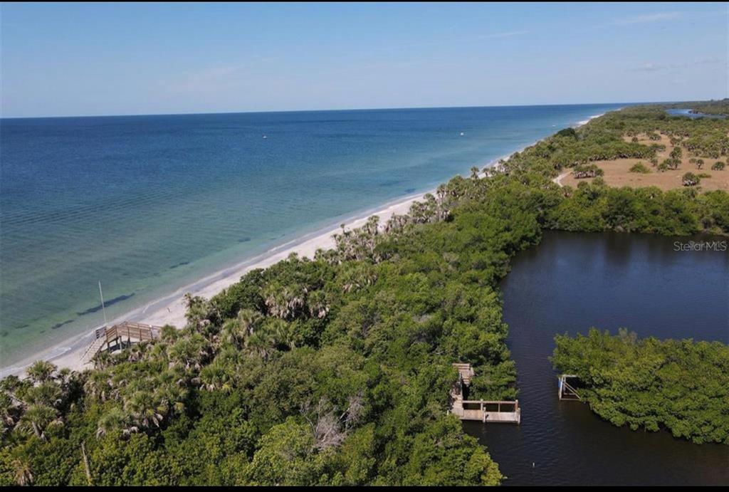 Southland Road Venice, FL 34293 - Photo 9 of 12 a view of a lake with a mountain in the background