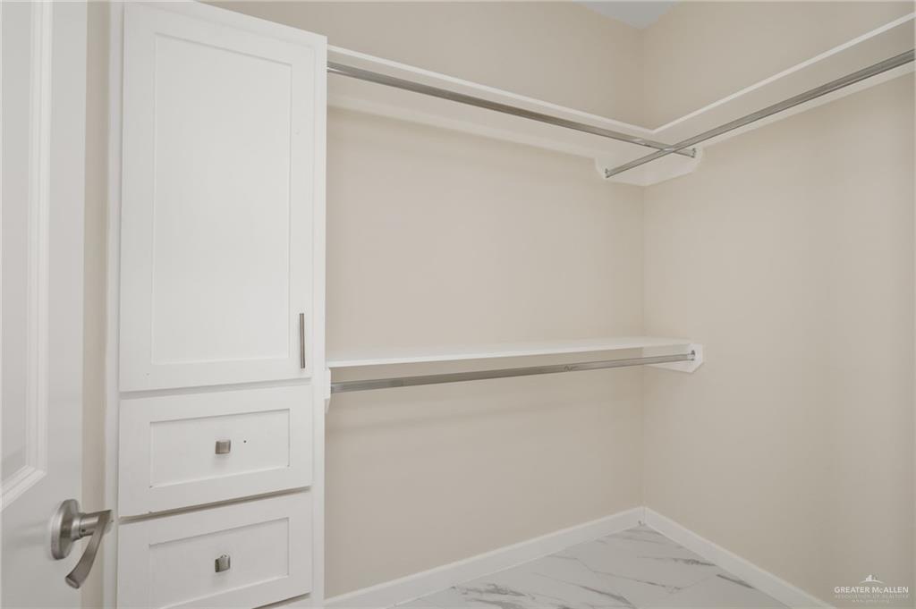 608 Mountain Road, Unit 9A Mission, TX 78573 - Photo 7 of 11 a view of an empty walk in closet