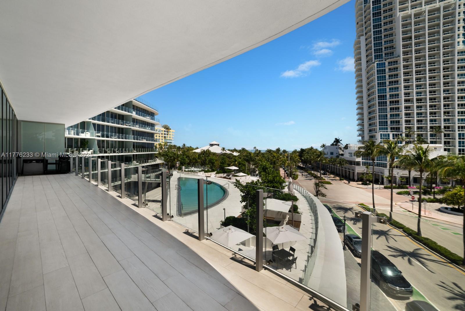 1 Collins Avenue, Unit 401 Miami Beach, FL 33139 - Photo 24 of 25 a view of balcony with furniture