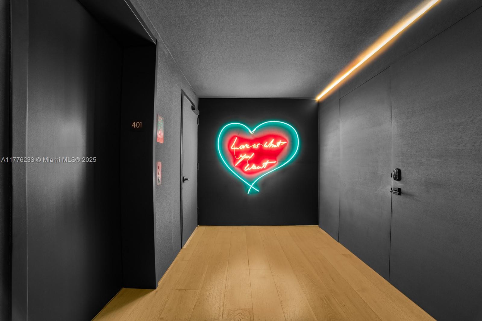 1 Collins Avenue, Unit 401 Miami Beach, FL 33139 - Photo 3 of 25 a view of a hallway