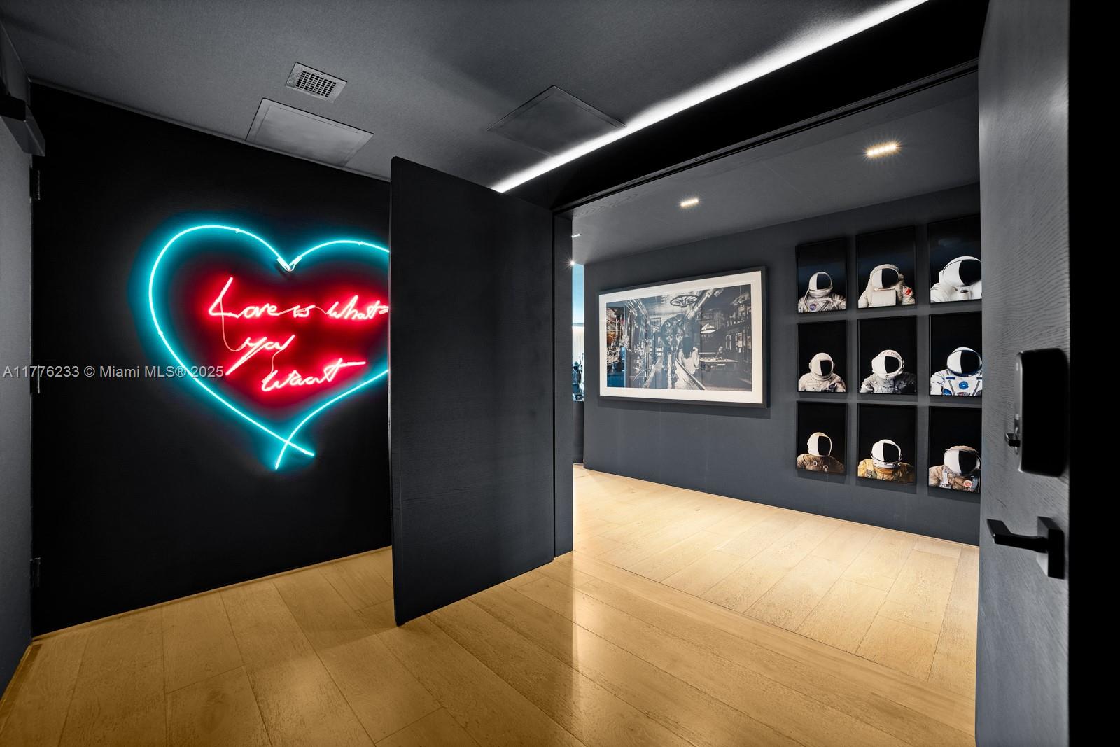 1 Collins Avenue, Unit 401 Miami Beach, FL 33139 - Photo 4 of 25 a view of a living room with natural light and fan