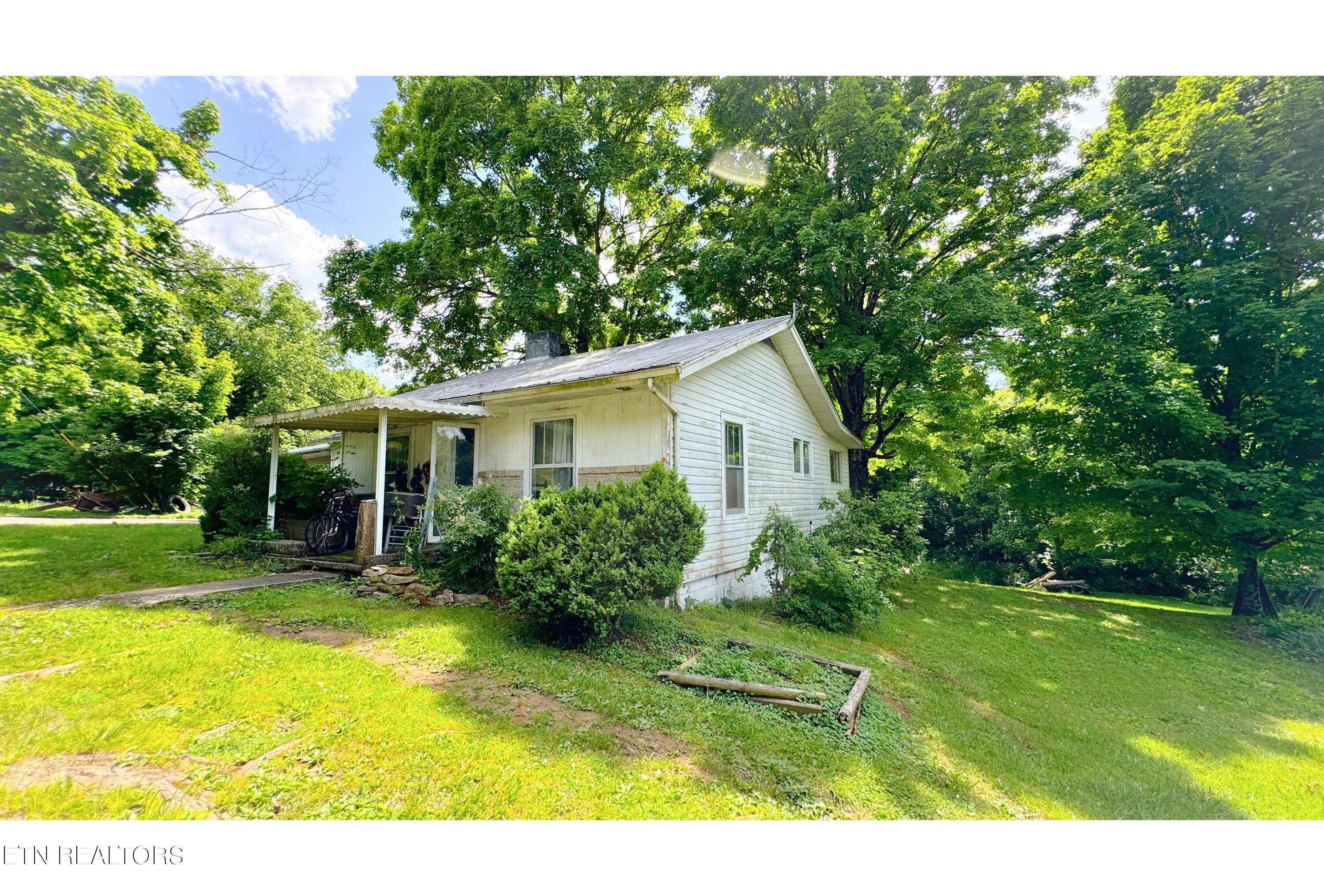 3405 Douglas Dam Road Kodak, TN 37764 - Photo 2 of 6 SIDE EXTERIOR OF HOME (1)