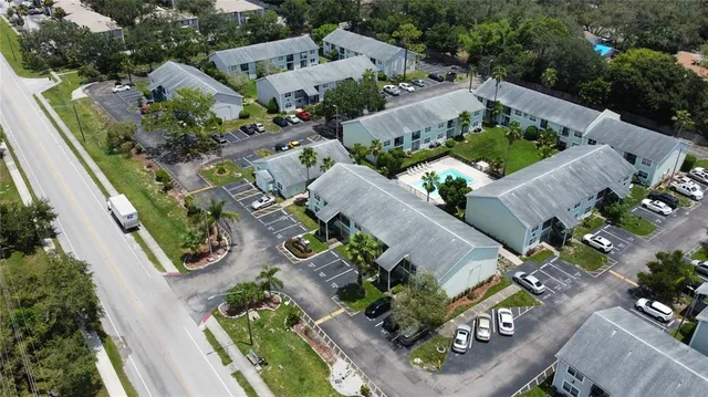 an aerial view of residential house with outdoor space