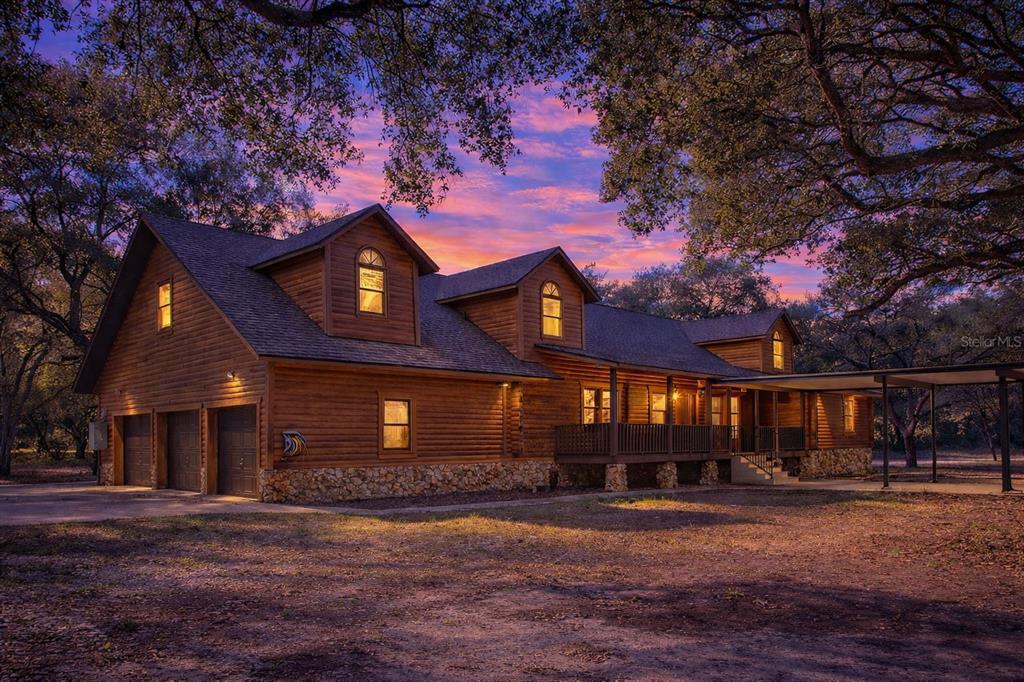 6892 Swain Road Sorrento, FL 32776 - Photo 38 of 57 a front view of a house with a yard