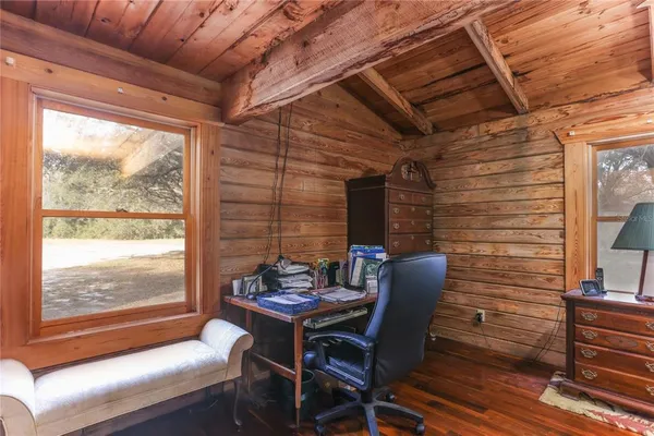 a view of livingroom with an empty space and a window
