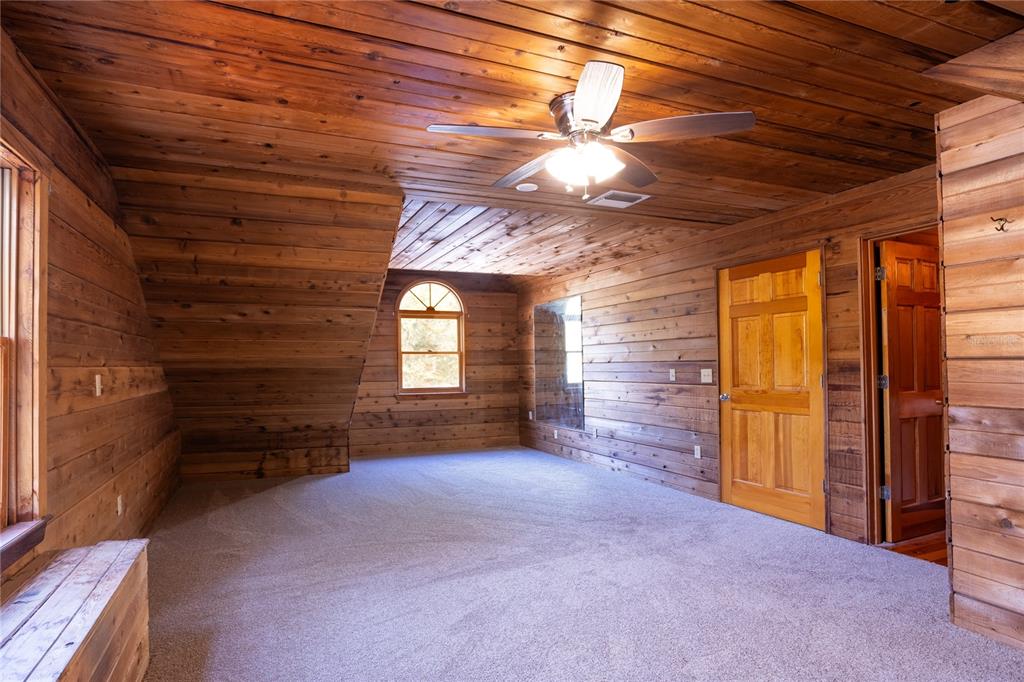 6892 Swain Road Sorrento, FL 32776 - Photo 56 of 57 a view of livingroom with an empty space and a window