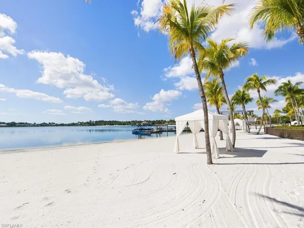 a view of a patio with a table and chairs