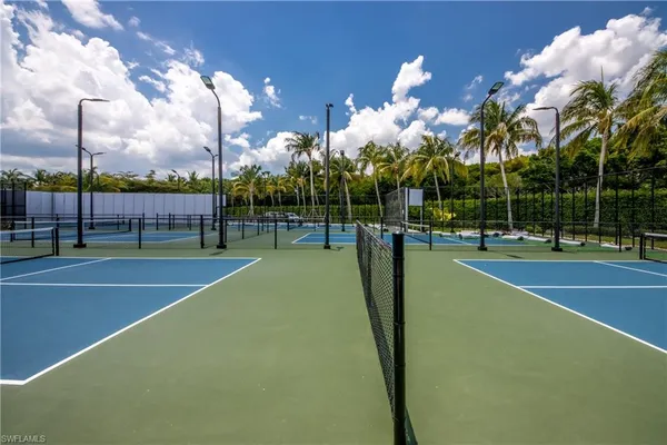 a view of a swimming pool with outdoor space and seating area