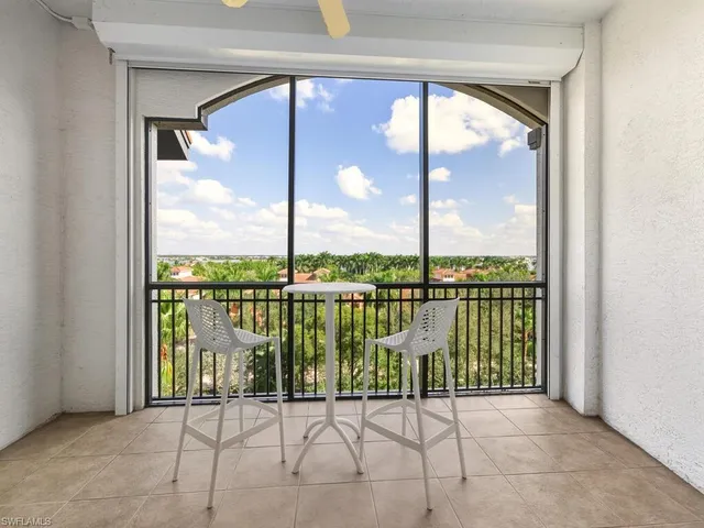 a view of a balcony with city view