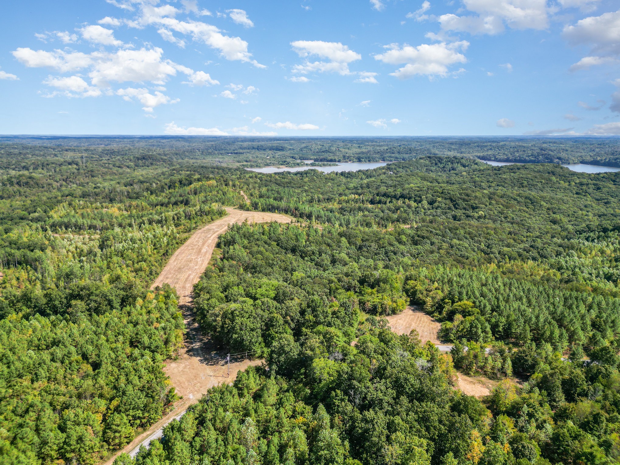 240 Miller Ridge Lane Stewart, TN 37175 - Photo 12 of 29 a view of a lake with a yard
