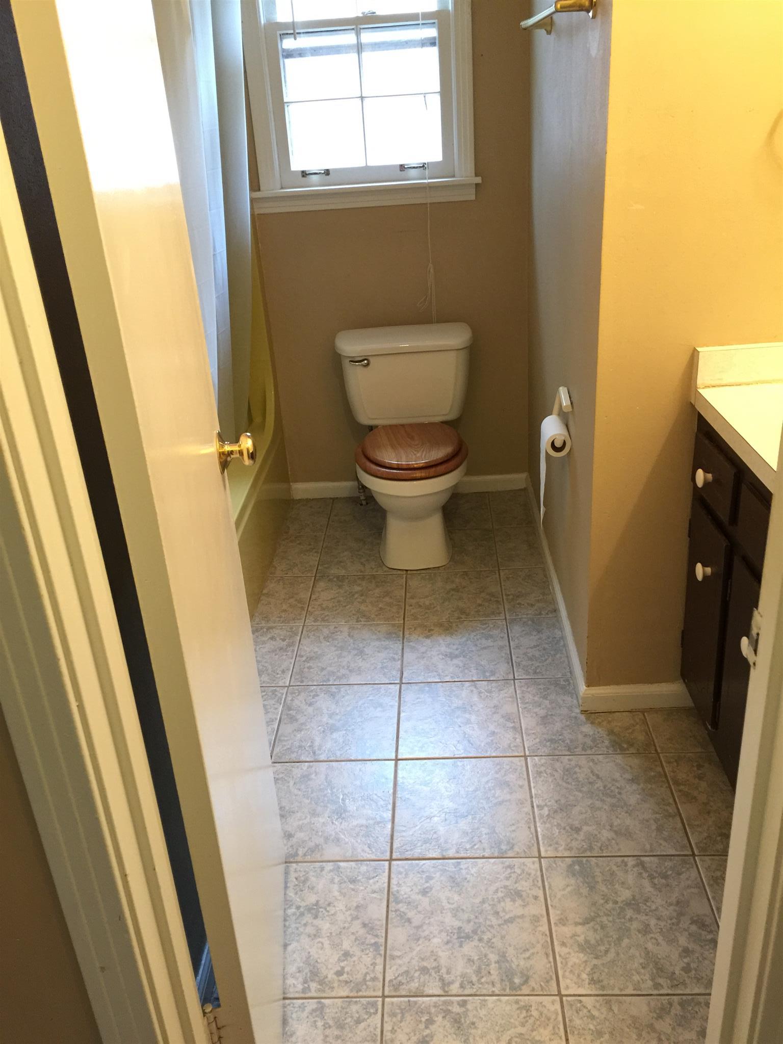 615 Bryan Road Clarksville, TN 37043 - Photo 12 of 22 a bathroom with a toilet and a shower