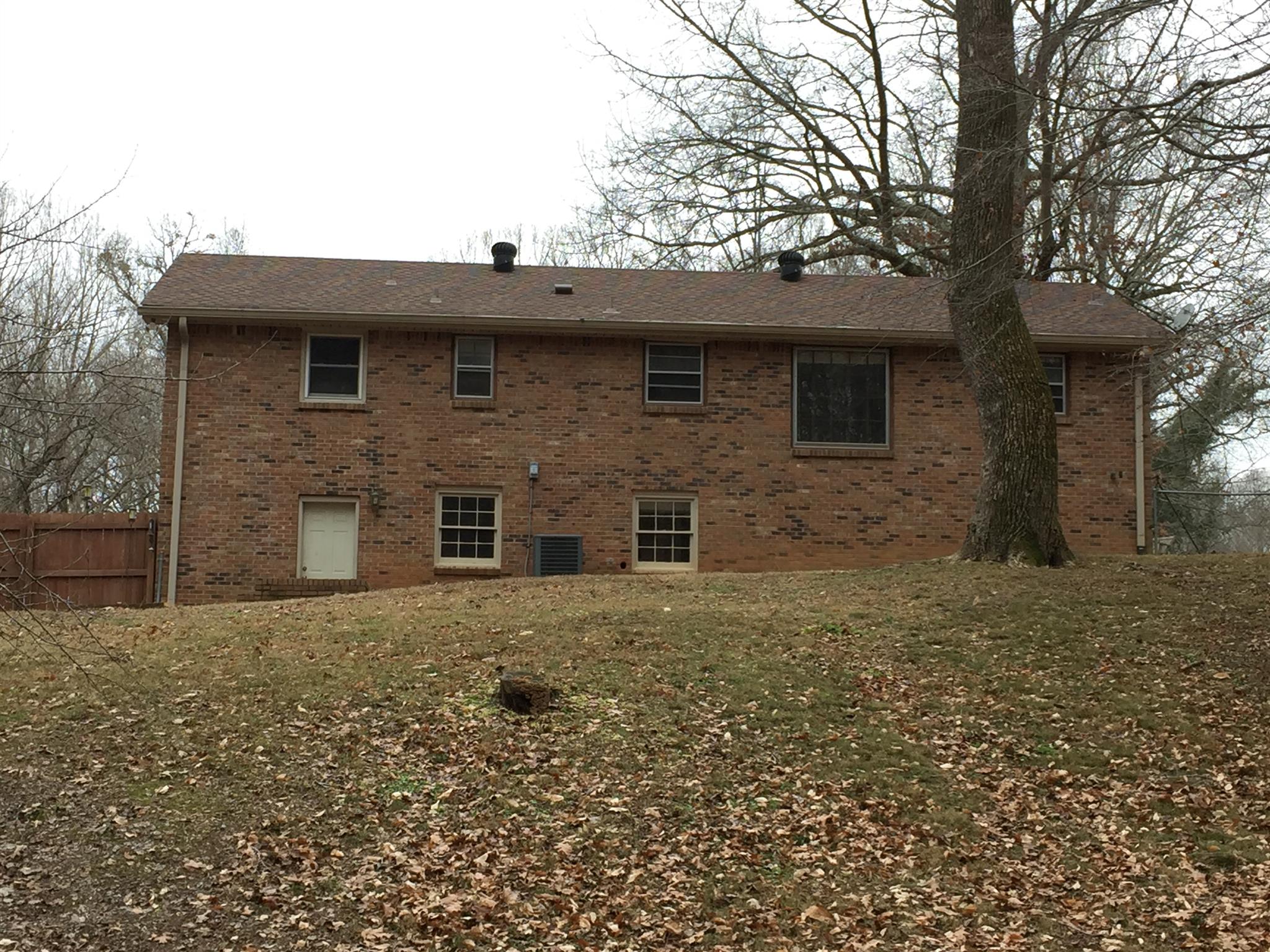 615 Bryan Road Clarksville, TN 37043 - Photo 20 of 22 a front view of a house with a garden