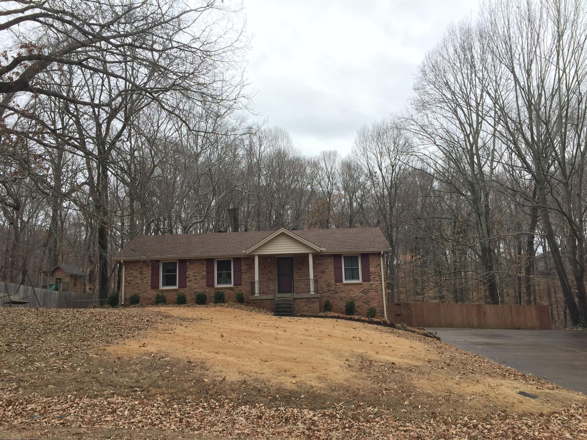 615 Bryan Road Clarksville, TN 37043 - Photo 3 of 22 a front view of a house with a yard