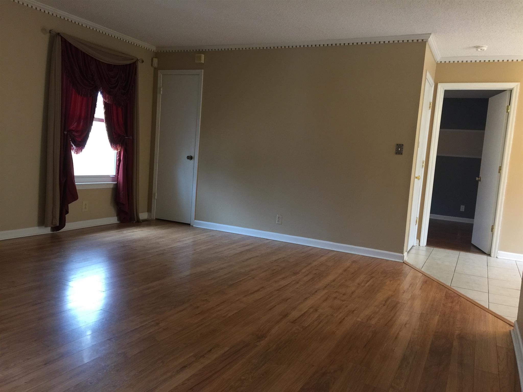 615 Bryan Road Clarksville, TN 37043 - Photo 5 of 22 an empty room with wooden floor and closet