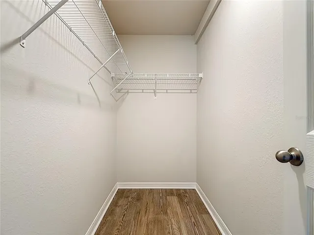 a view of a room with racks on the wall