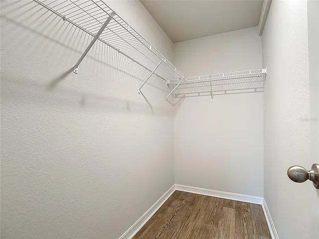 a view of a room with racks on the wall