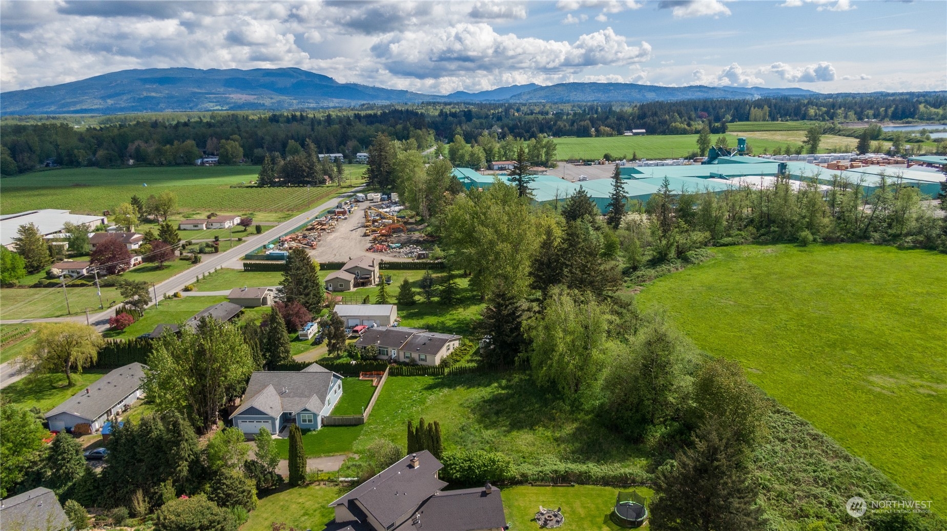 1305 Mission Road Everson, WA 98247 - Photo 8 of 19 an aerial view of a houses with outdoor space and lake view