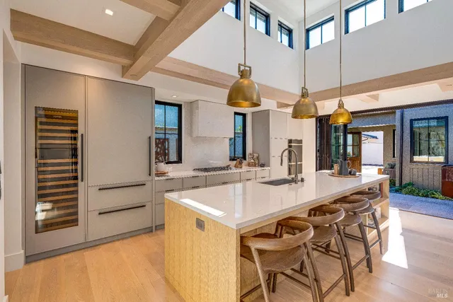 a lobby with furniture and floor to ceiling window