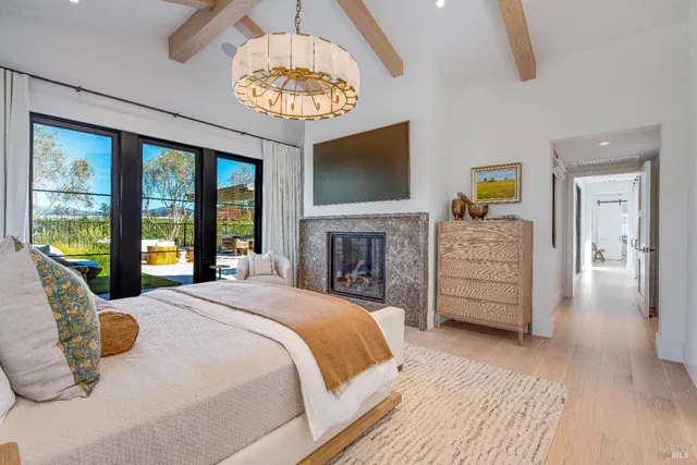 a bathroom with a granite countertop sink mirror and shower
