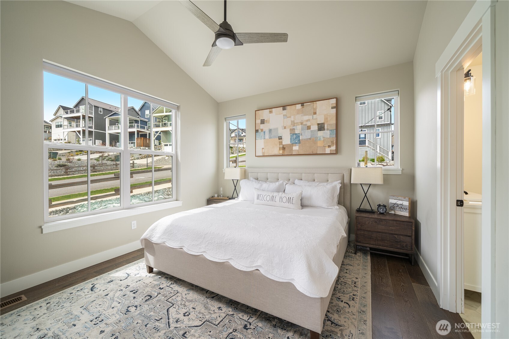 187 Bobcat Lane Chelan, WA 98816 - Photo 14 of 40 a bedroom with a bed and a window