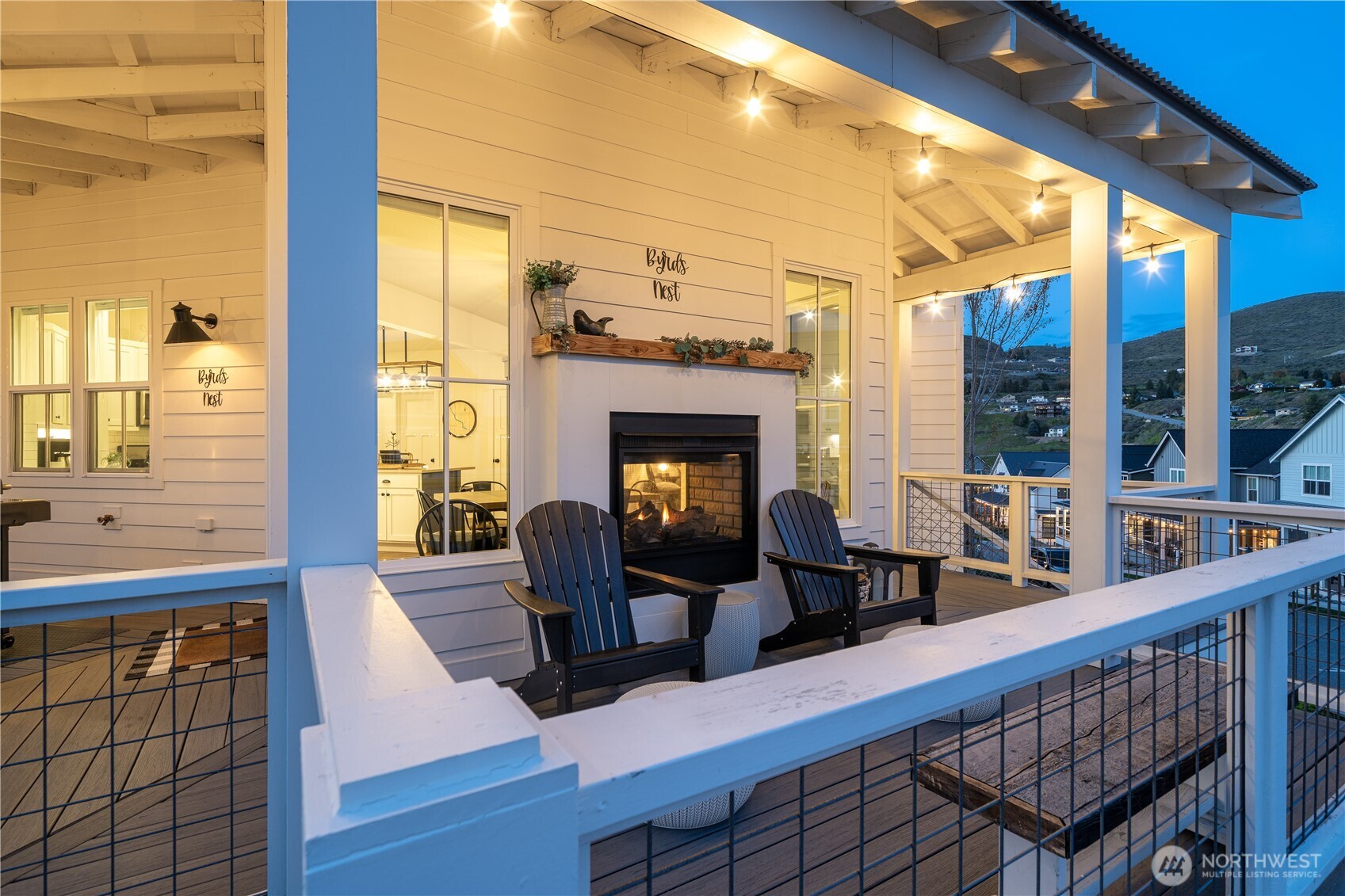 187 Bobcat Lane Chelan, WA 98816 - Photo 25 of 40 a view of a dining room with furniture window and outside view
