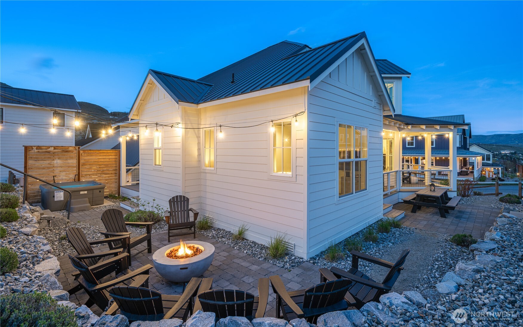 187 Bobcat Lane Chelan, WA 98816 - Photo 30 of 40 a view of a porch with furniture and a yard