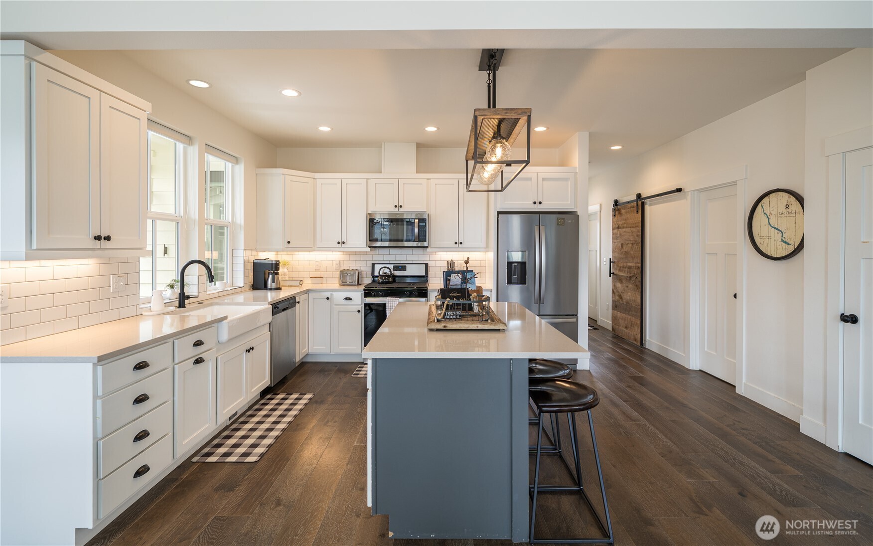 187 Bobcat Lane Chelan, WA 98816 - Photo 7 of 40 a large kitchen with cabinets
