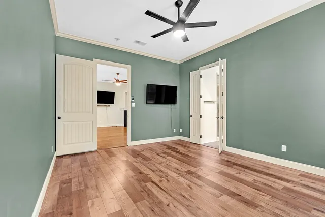 a view of a livingroom with wooden floor