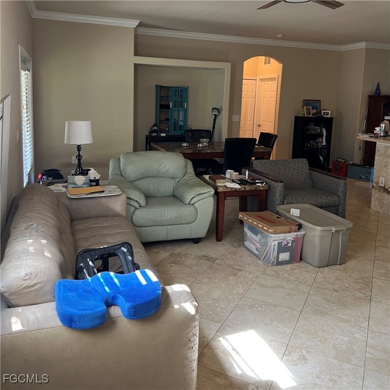 2702 Nature Pointe Loop Fort Myers, FL 33905 - Photo 11 of 25 a living room with furniture and a mirror