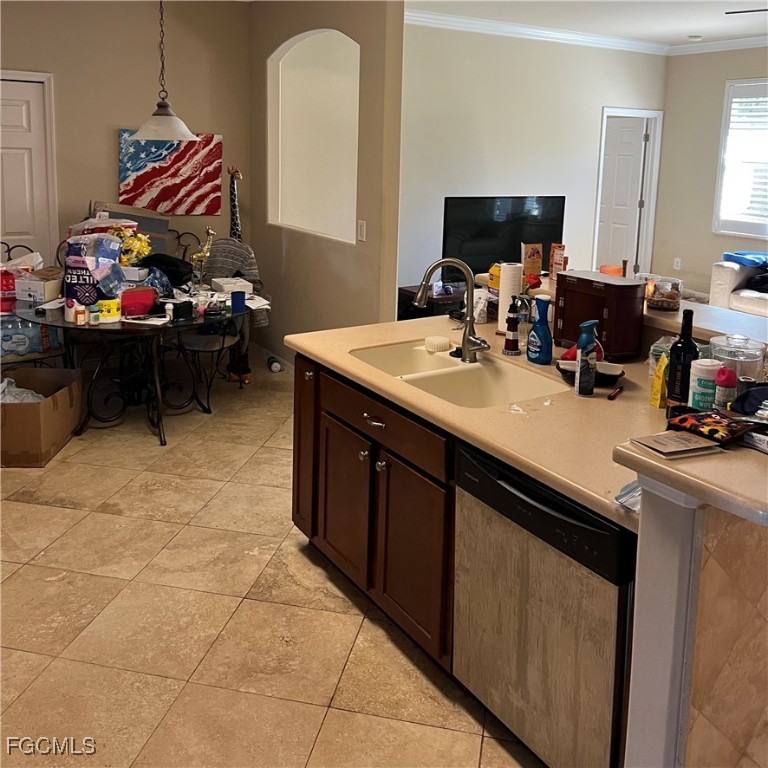 2702 Nature Pointe Loop Fort Myers, FL 33905 - Photo 12 of 25 a kitchen with a sink and a stove