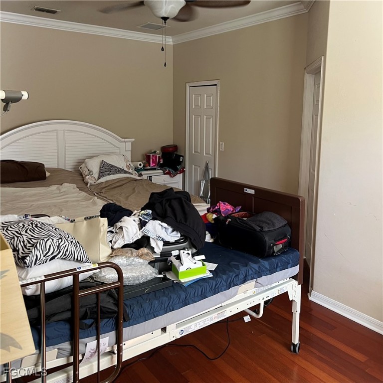 2702 Nature Pointe Loop Fort Myers, FL 33905 - Photo 16 of 25 a bed room with a bed and a table