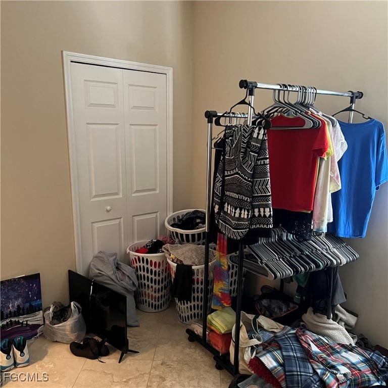 2702 Nature Pointe Loop Fort Myers, FL 33905 - Photo 23 of 25 a view of a closet with storage