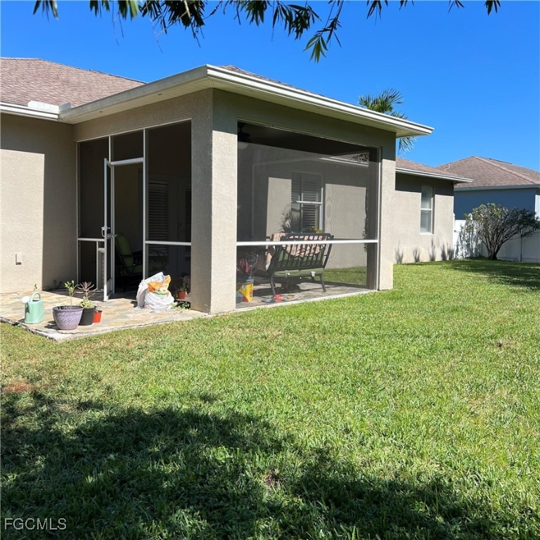 2702 Nature Pointe Loop Fort Myers, FL 33905 - Photo 7 of 25 a view of a house with backyard and porch