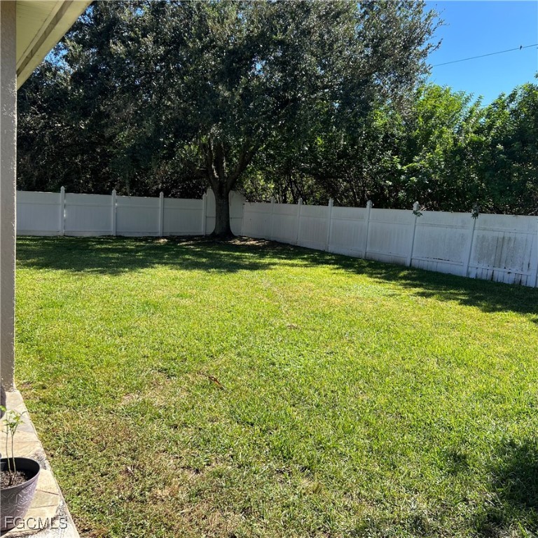 2702 Nature Pointe Loop Fort Myers, FL 33905 - Photo 8 of 25 a view of a backyard
