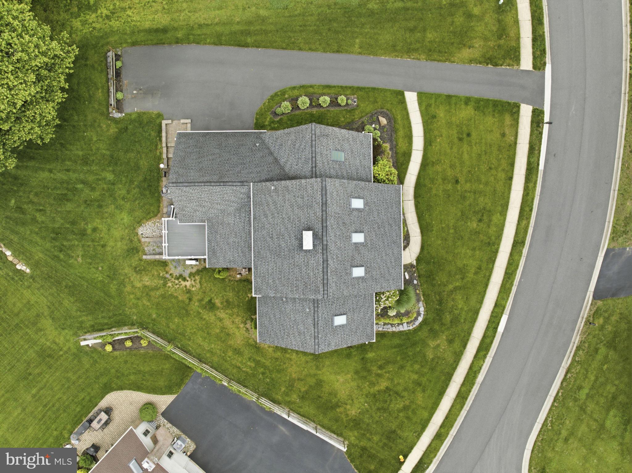 736 Letitia Drive Hockessin, DE 19707 - Photo 92 of 92 an aerial view of a house with a garden