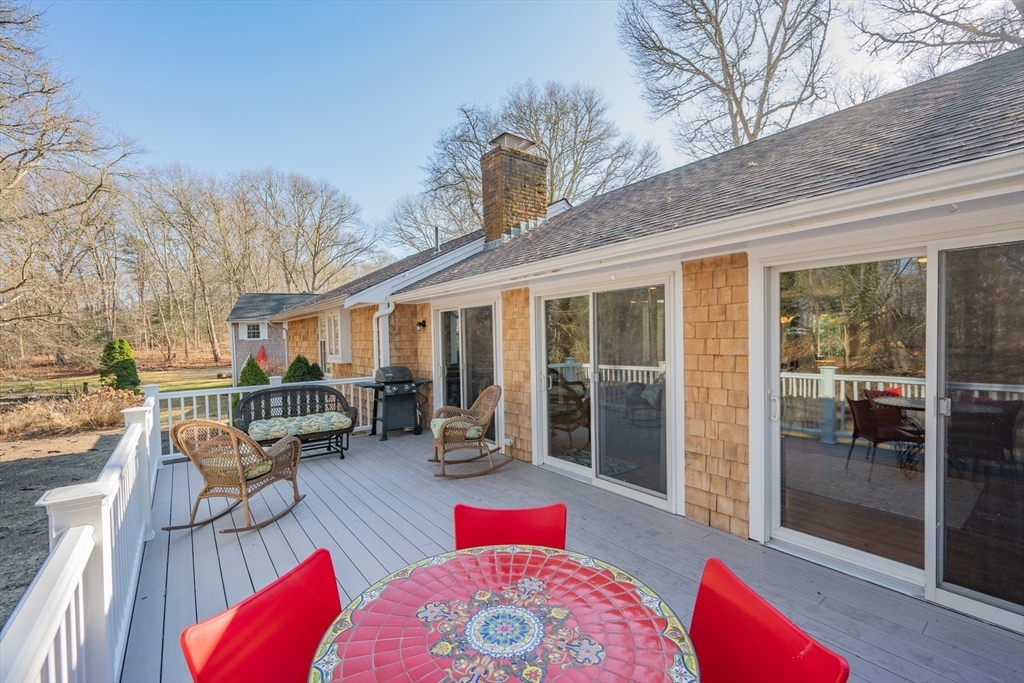 91 Holly Point Road Barnstable, MA 02632 - Photo 31 of 42 a outdoor space with lots of furniture and a couch