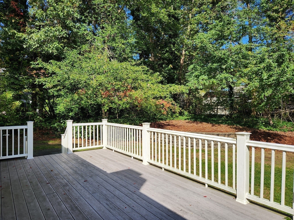 91 Holly Point Road Barnstable, MA 02632 - Photo 32 of 42 a view of a wooden roof deck