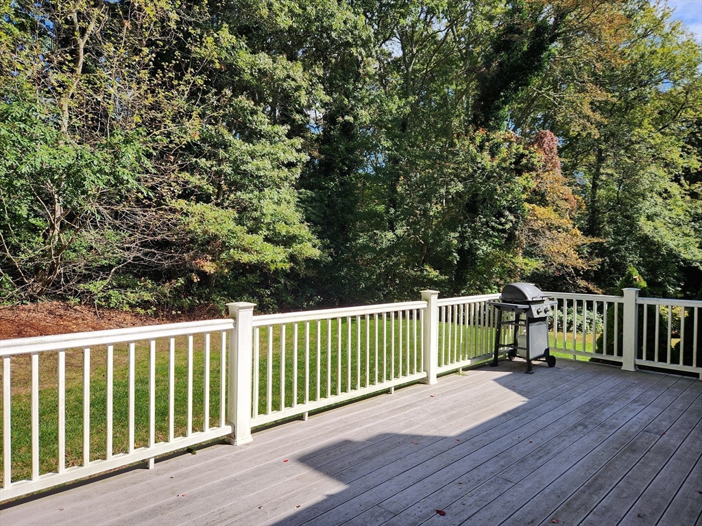 91 Holly Point Road Barnstable, MA 02632 - Photo 34 of 42 a view of a deck with a large window and wooden floor