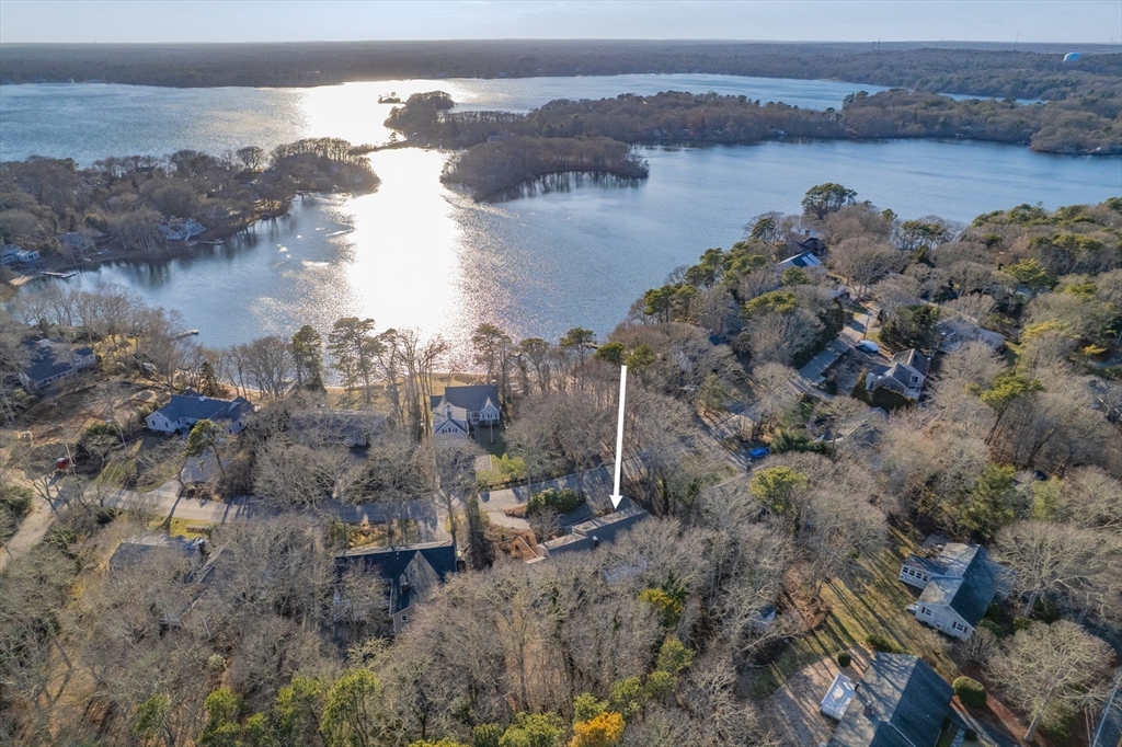 91 Holly Point Road Barnstable, MA 02632 - Photo 42 of 42 a view of a lake with a mountain and lake view