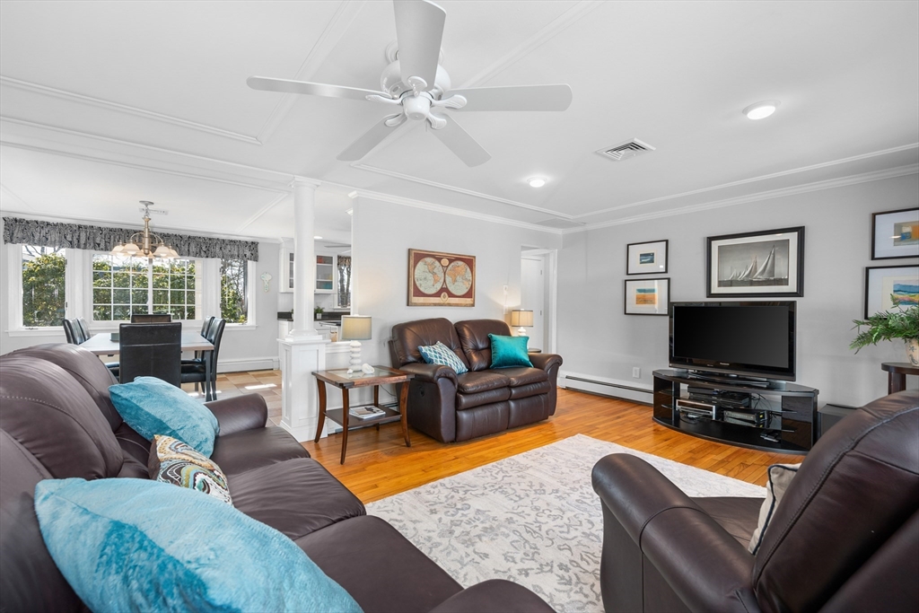 91 Holly Point Road Barnstable, MA 02632 - Photo 5 of 42 a living room with furniture and a flat screen tv