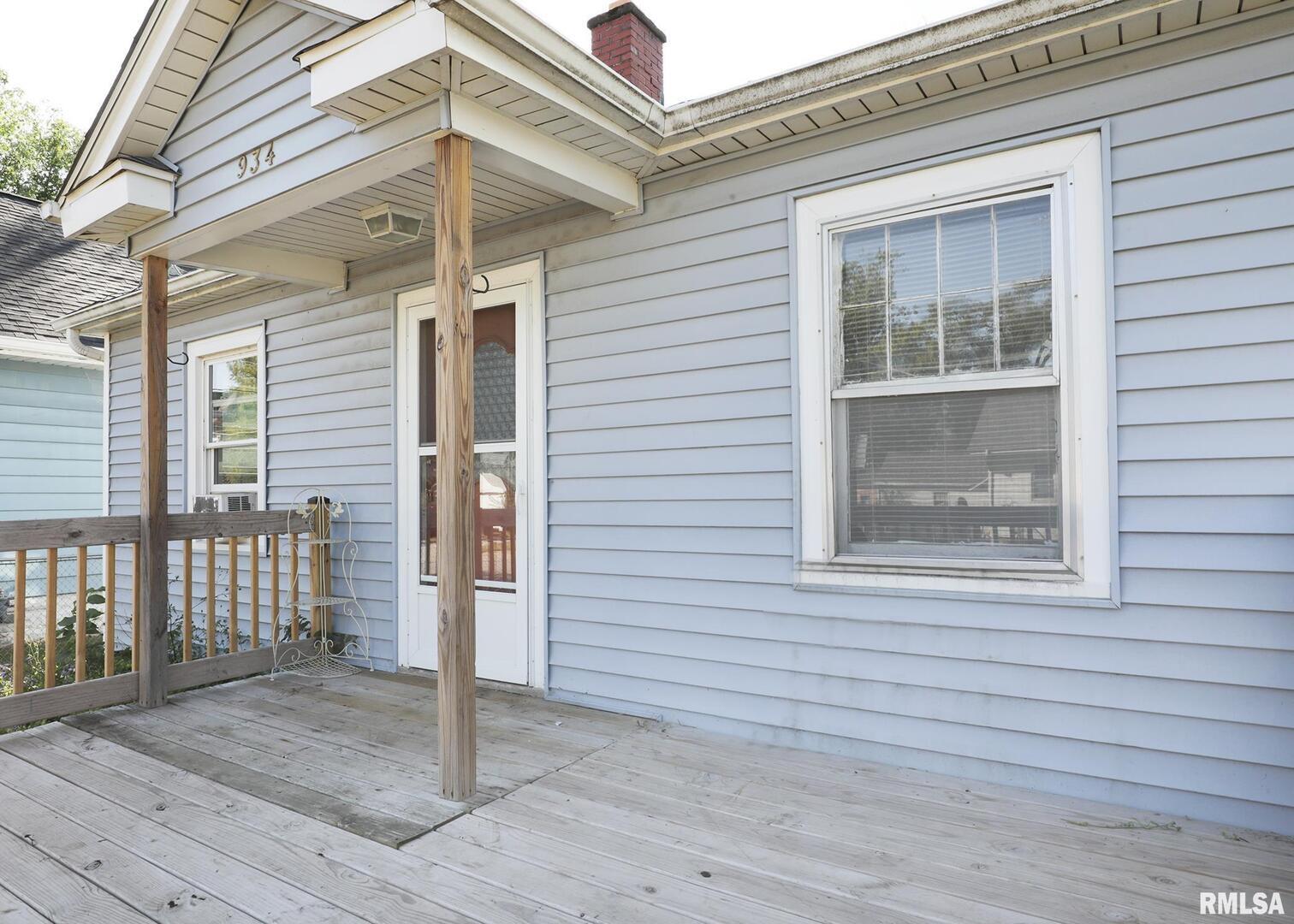 934 20th Avenue Rock Island, IL 61201 - Photo 2 of 26 a view of a house with wooden fence