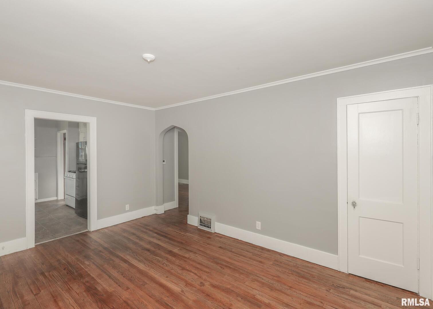 934 20th Avenue Rock Island, IL 61201 - Photo 5 of 26 a view of empty room with wooden floor